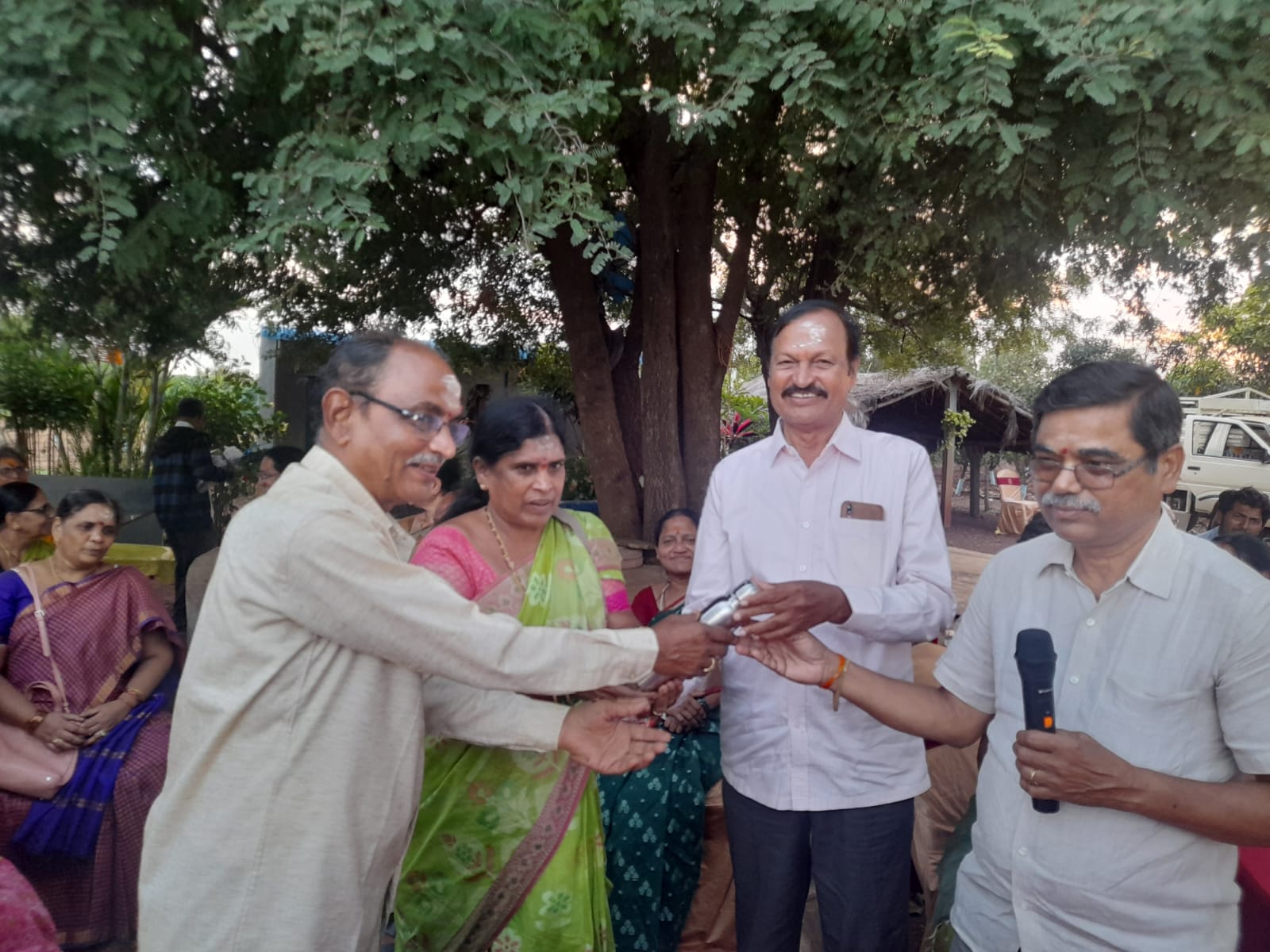Konda Reddy Garu along with his wife receiving Second prize in Musical chair (Men) in get-together party held on 22-11-2023.